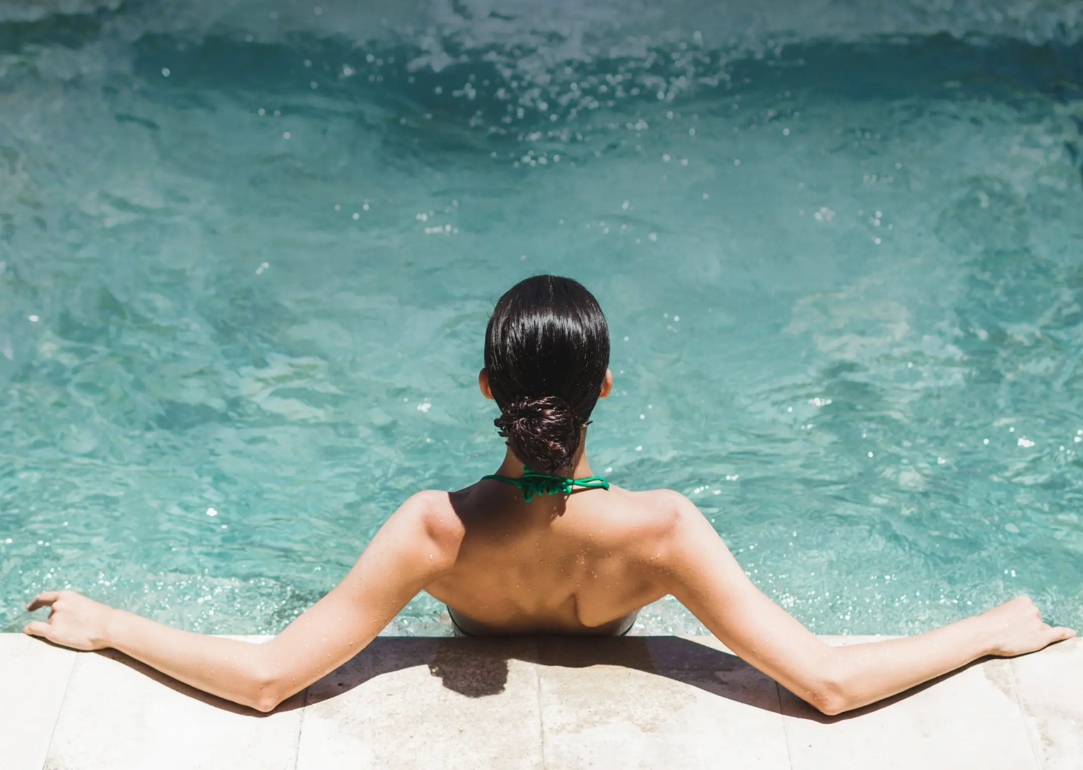 Women relaxing in luxury bespoke outdoor hydropool