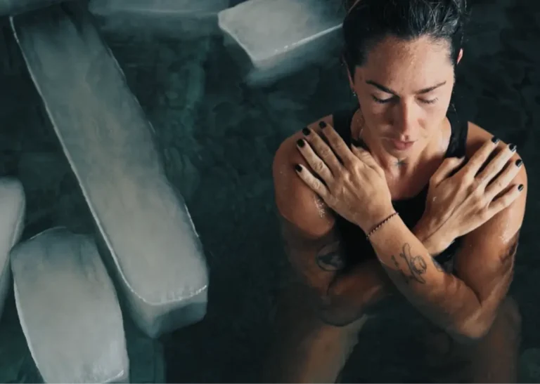 Women in ice bath for sports recovery