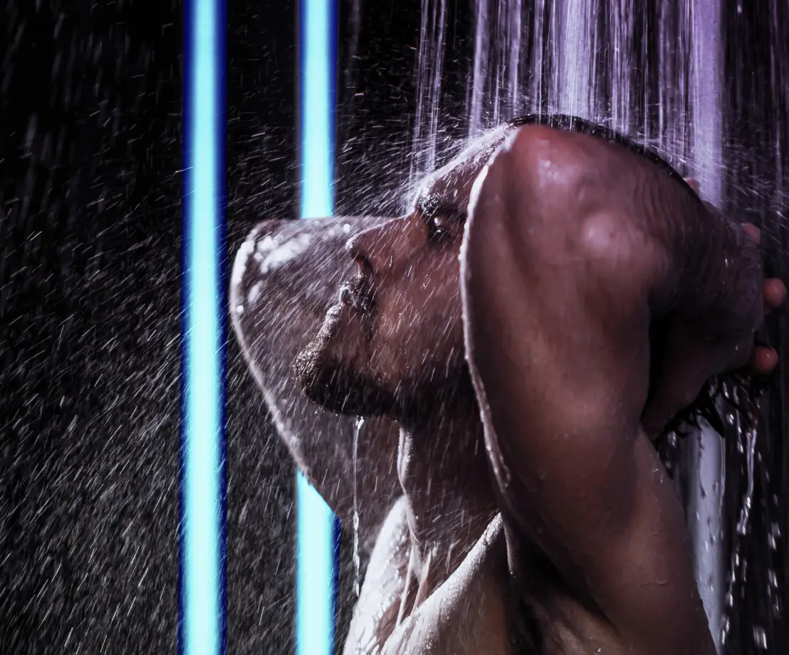 Man using a spa experience shower